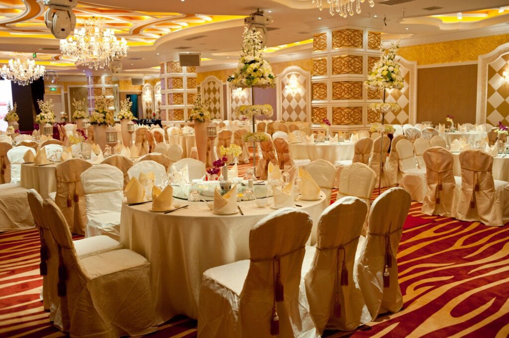 A banquet hall with many tables and chairs